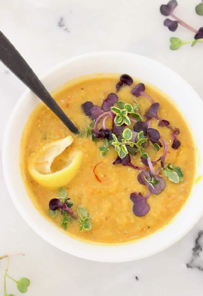Healthy lemon lentil soup recipe with fresh thyme, cumin and a touch of saffron.