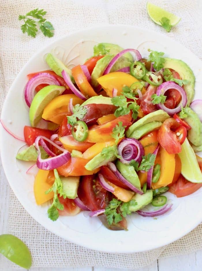 Simple Avocado Tomato Salad with Lime Dressing and Purple Onions