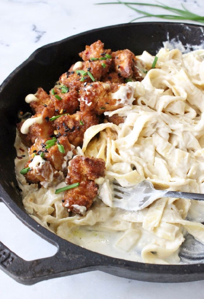 Best vegan Alfredo sauce recipe with fettuccine noodles and air fried tofu.