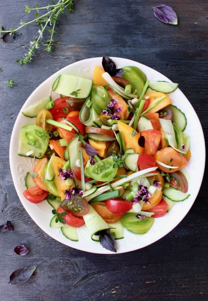 Heirloom Tomato Onion Cucumber Salad Recipe with Vinegar Dressing and Basil.