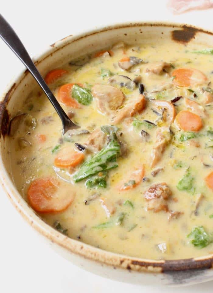 vegan wild rice soup with mushrooms and kale