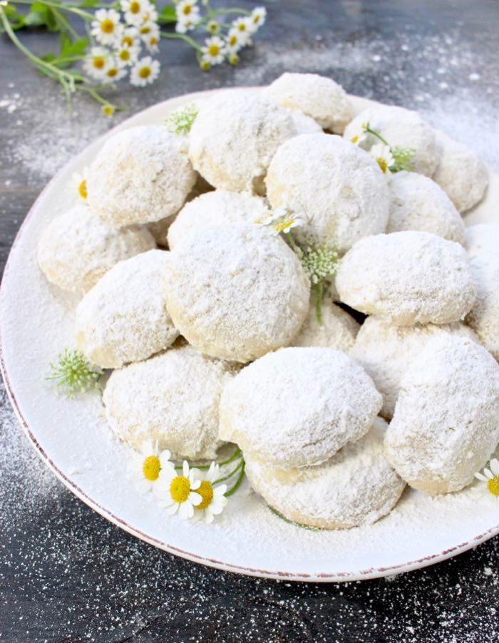 Best vegan Italian wedding cookies recipe with walnuts and hazelnuts.