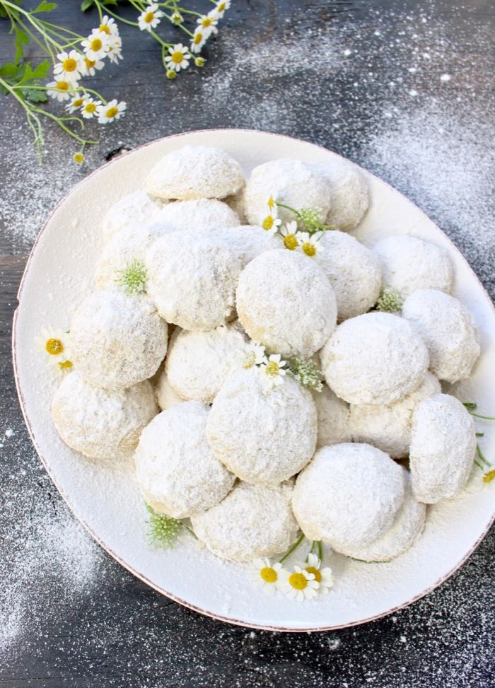 Best vegan Italian wedding cookies recipe with walnuts and hazelnuts.