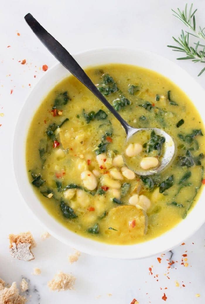 Tuscan White Bean Kale Soup recipe with winter squash, leeks, lacinato kale and creamy cannellini beans.