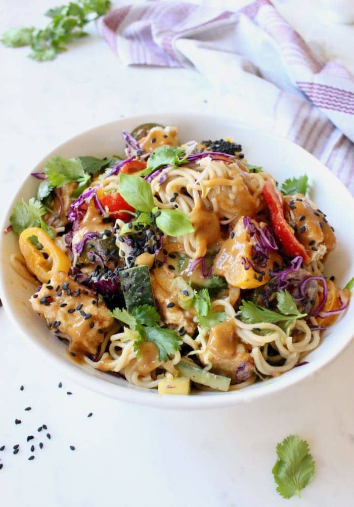 Vegan peanut noodles with vegetables and tofu.