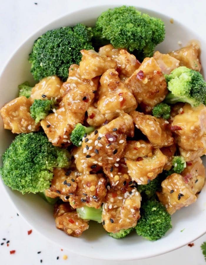 Healthy sesame tofu recipe with garlic ginger sesame sauce and broccoli.