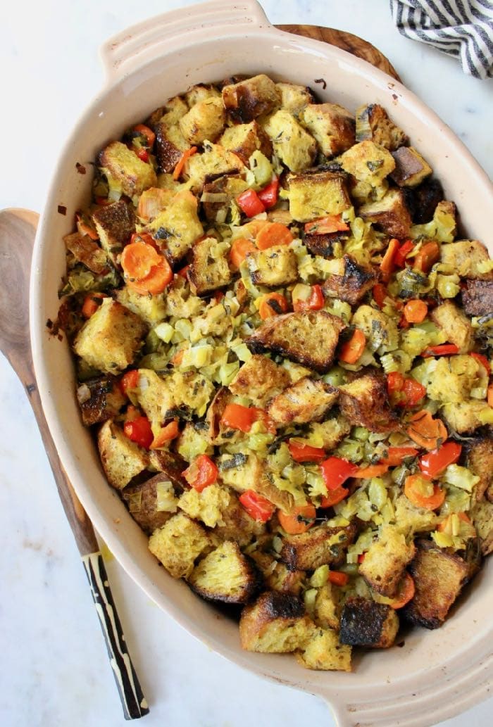The best Classic Bread Stuffing recipe with caramelized leeks, veggies, crusty bread, sage and thyme