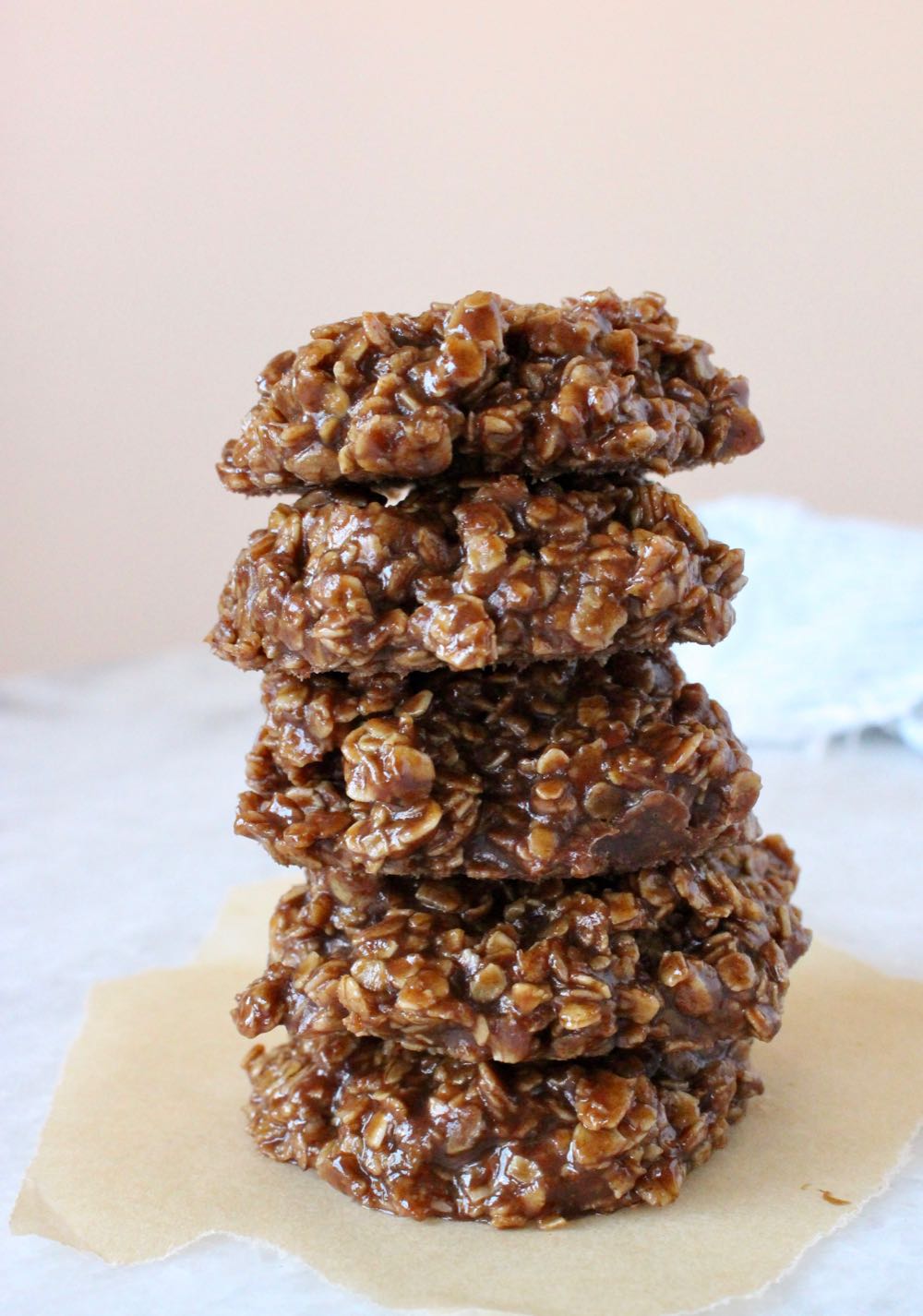 Stacked up vegan no bake cookies with oatmeal and peanut butter