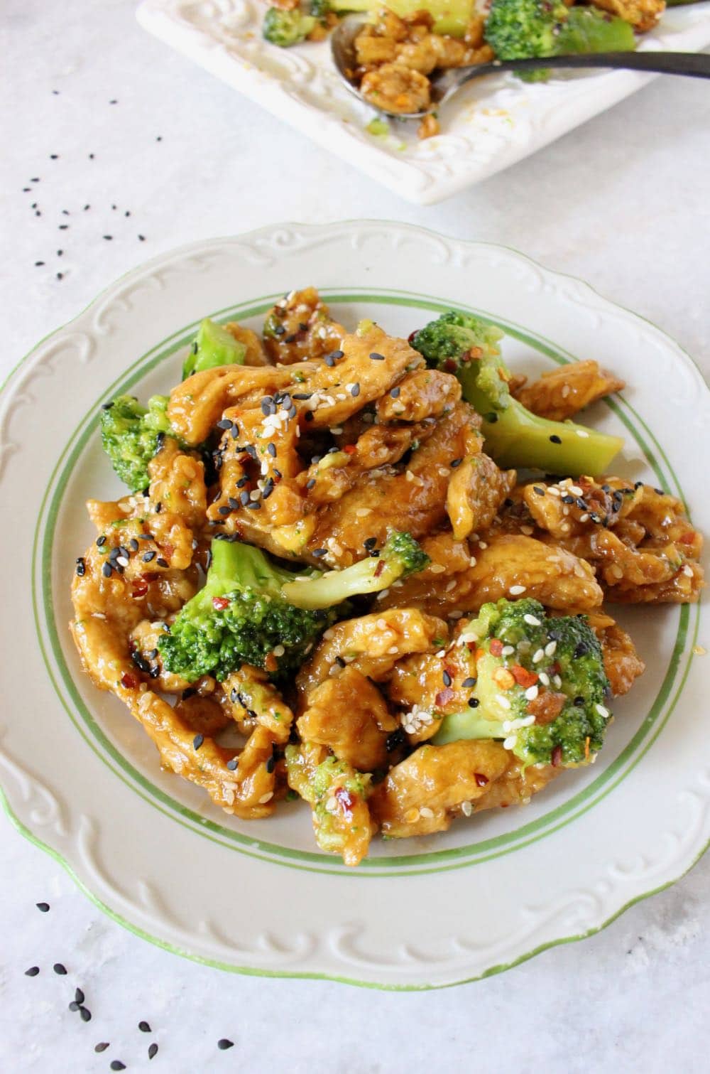 Plate of vegan chick'n with broccoli.