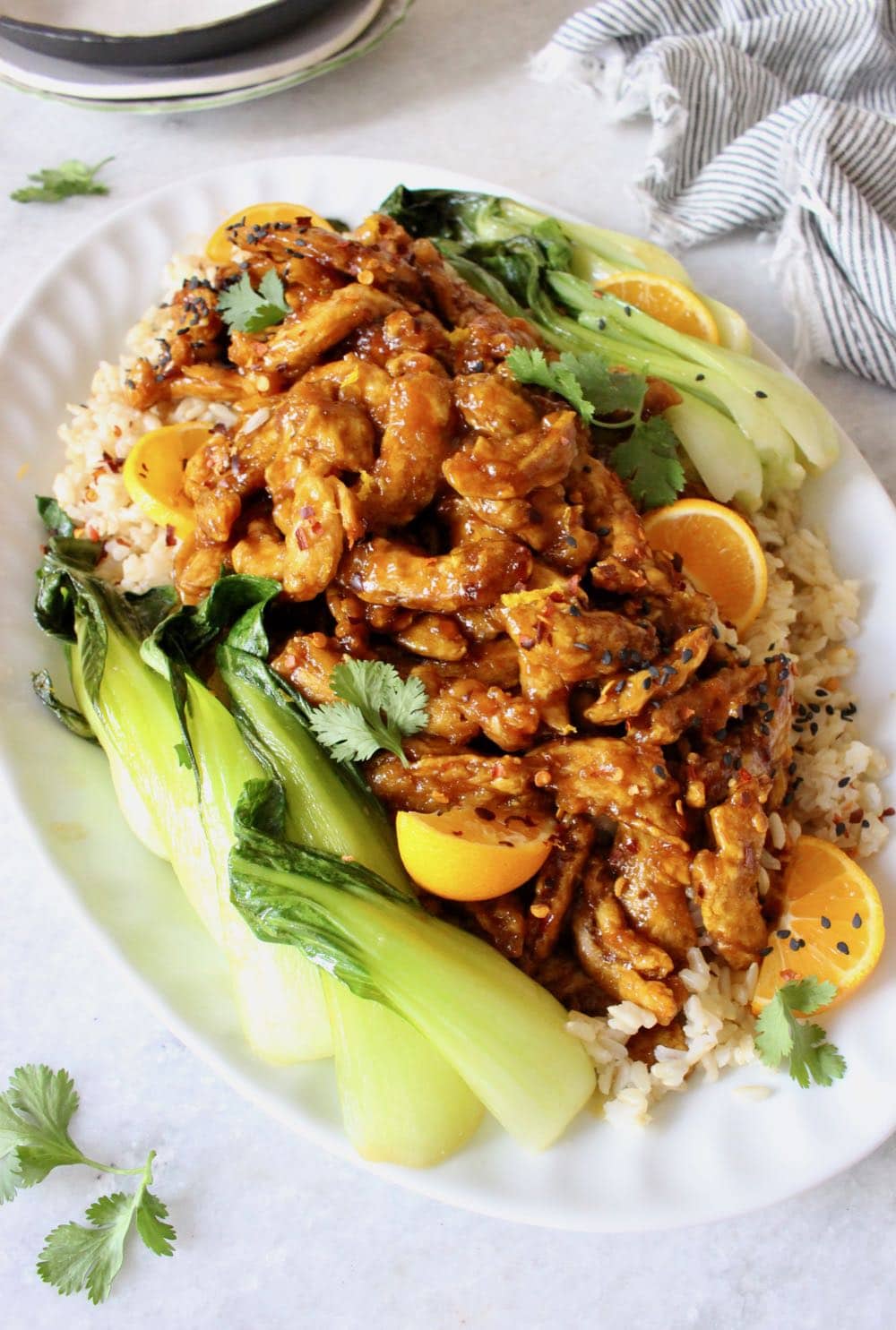 vegan orange chicken with soy curls, rice and bok choy