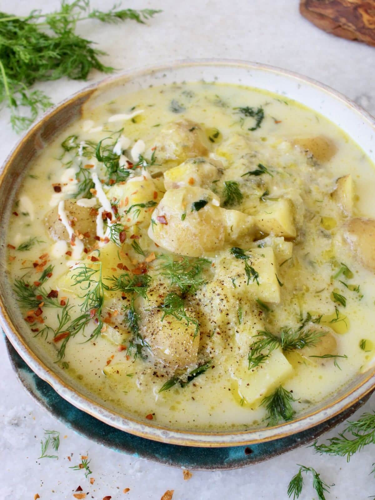 Chunky potato soup with dill, leeks and sour cream