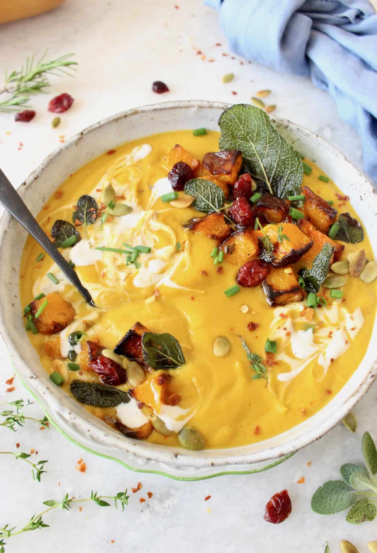 savory butternut squash soup with leeks, sage and rosemary - vegan recipe