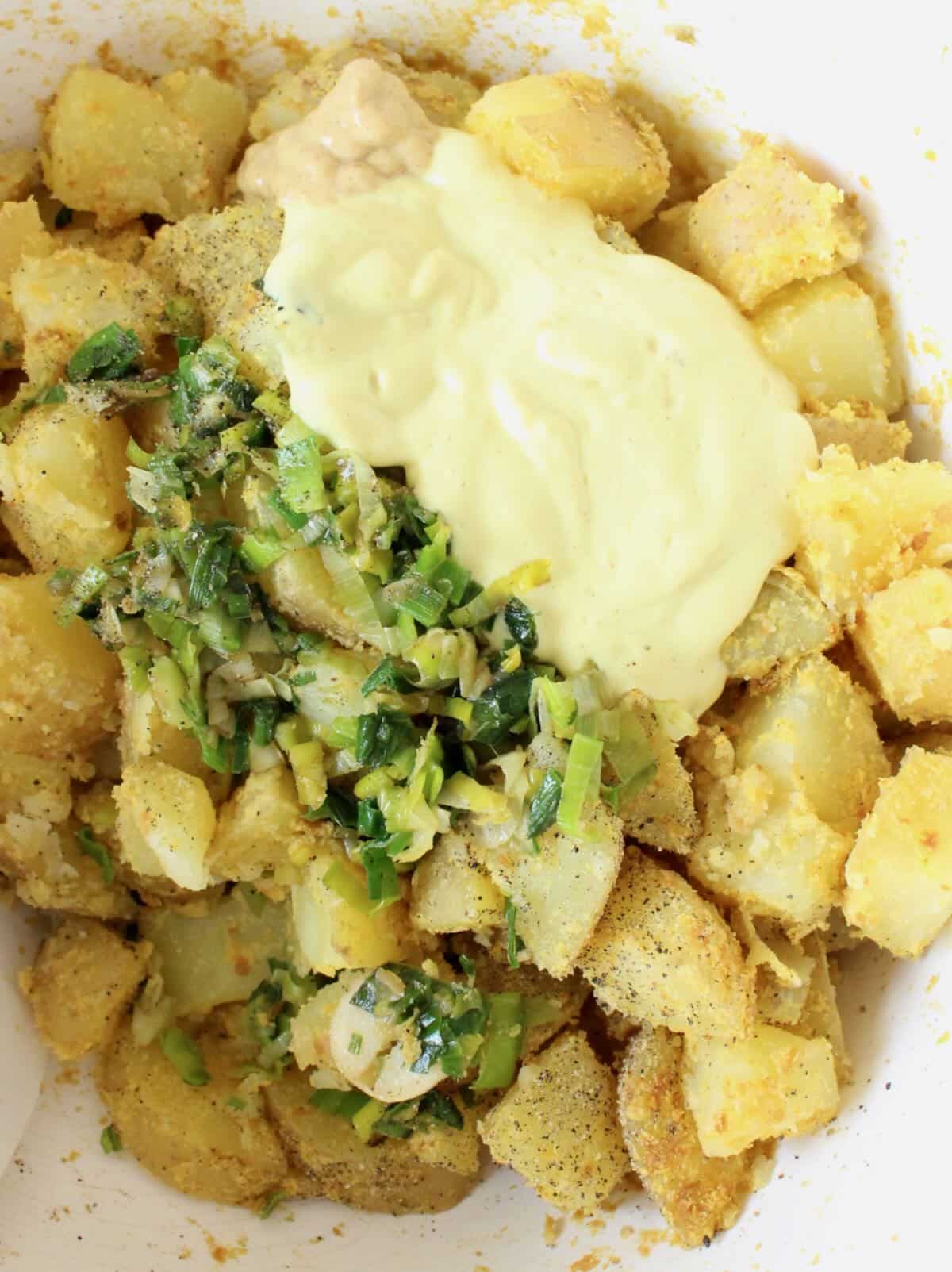 golden potato salad with sautéed leeks